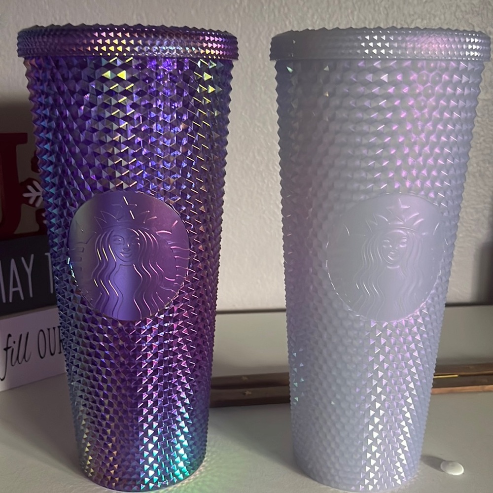 Two Starbucks cups